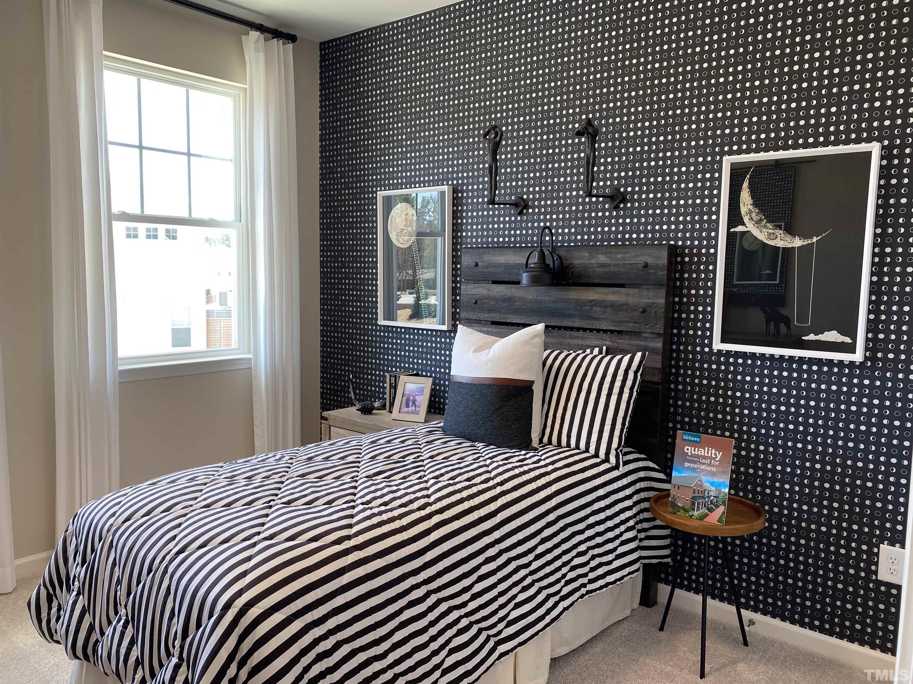 1258 Commack Drive Durham, NC 27703 - Photo 20 of 68 a bedroom with a bed and a window