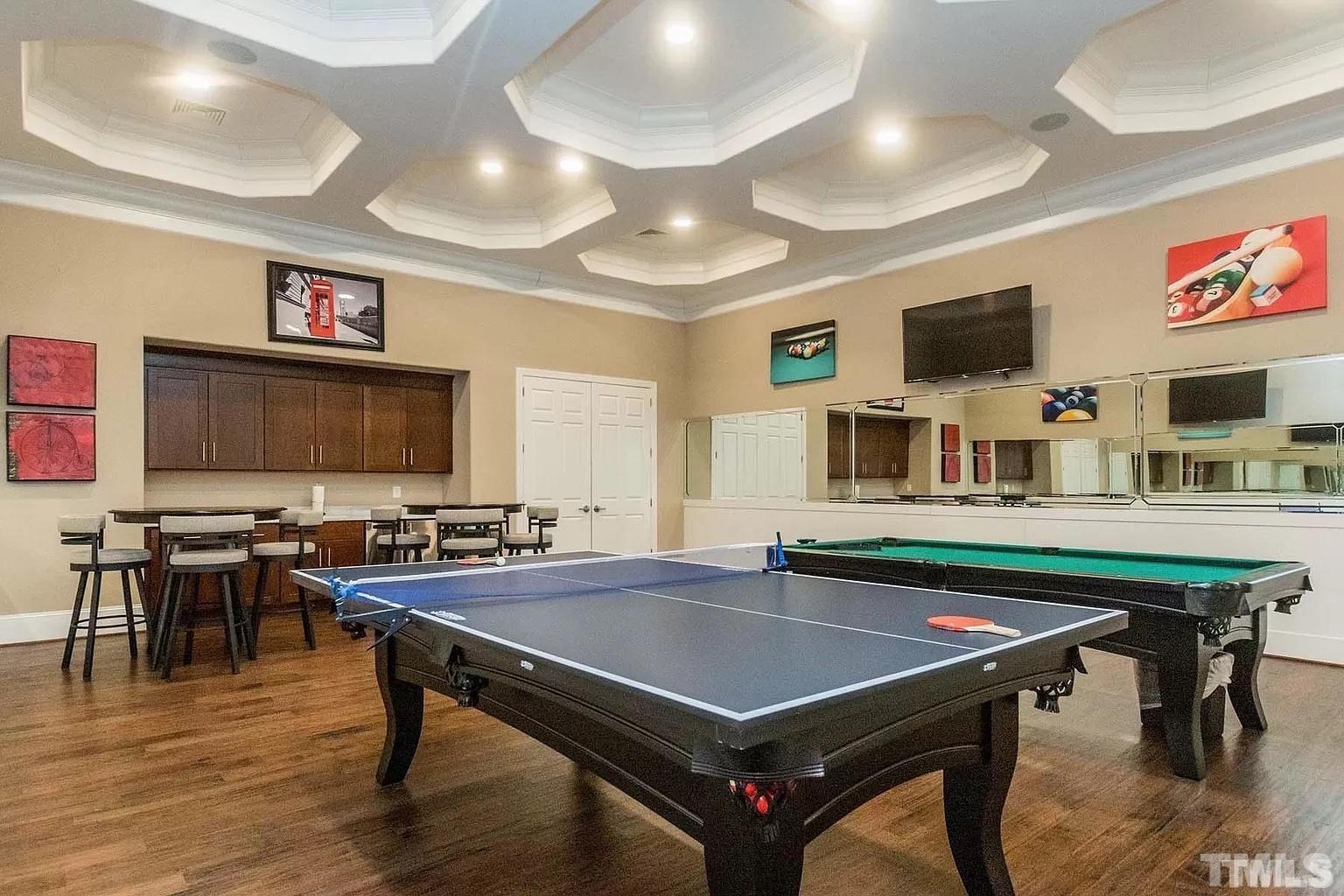 1258 Commack Drive Durham, NC 27703 - Photo 42 of 68 a room with furniture pool table flat screen tv and windows