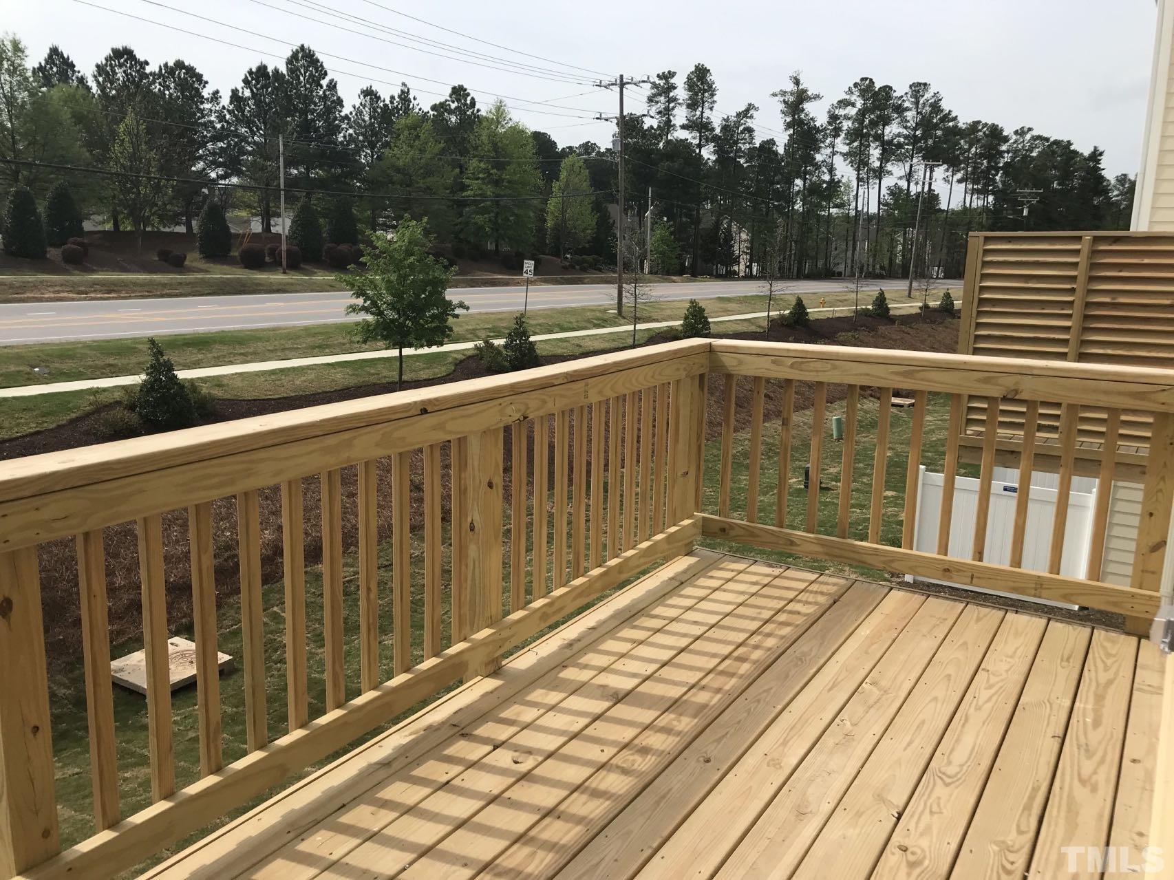 1258 Commack Drive Durham, NC 27703 - Photo 58 of 68 a view of balcony with wooden floor and outdoor space