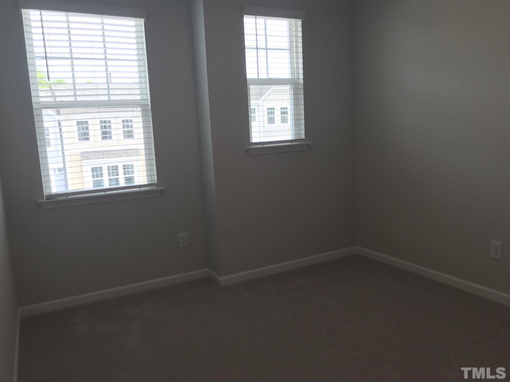 1258 Commack Drive Durham, NC 27703 - Photo 66 of 68 an empty room with a window