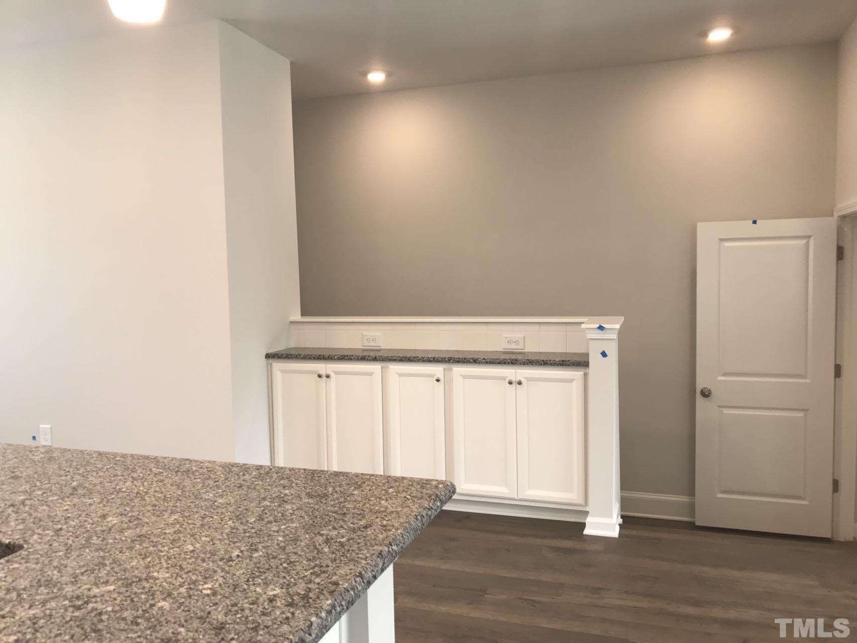 1258 Commack Drive Durham, NC 27703 - Photo 68 of 68 an empty room with wooden floor and closet