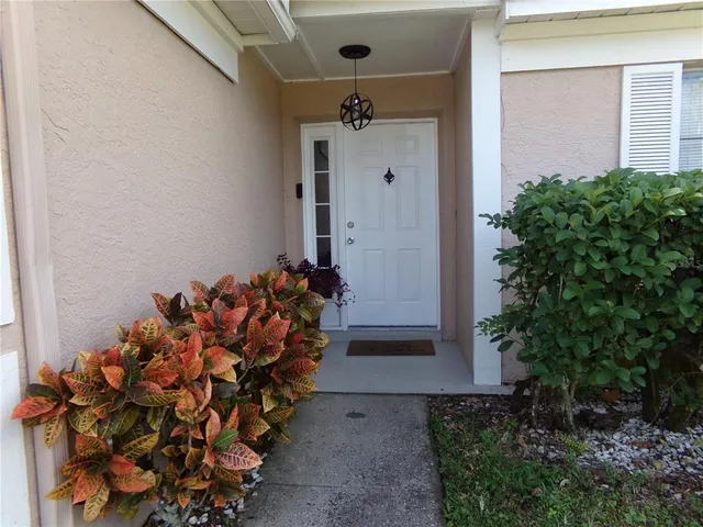 a view of a pathway with a yard