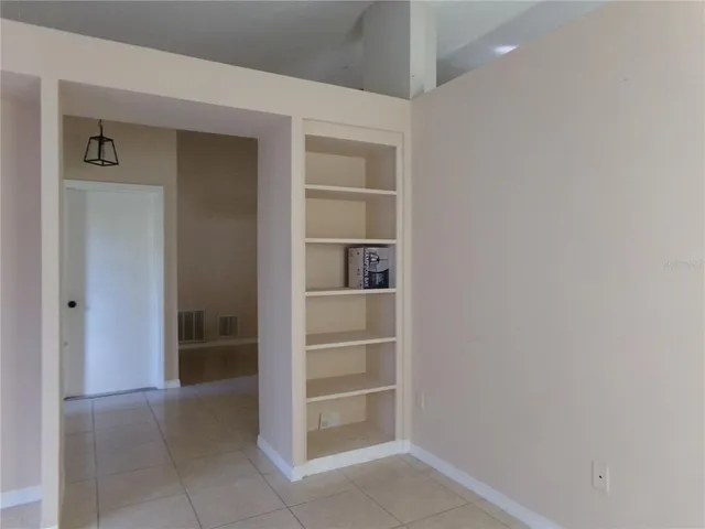 a view of an empty walk in closet