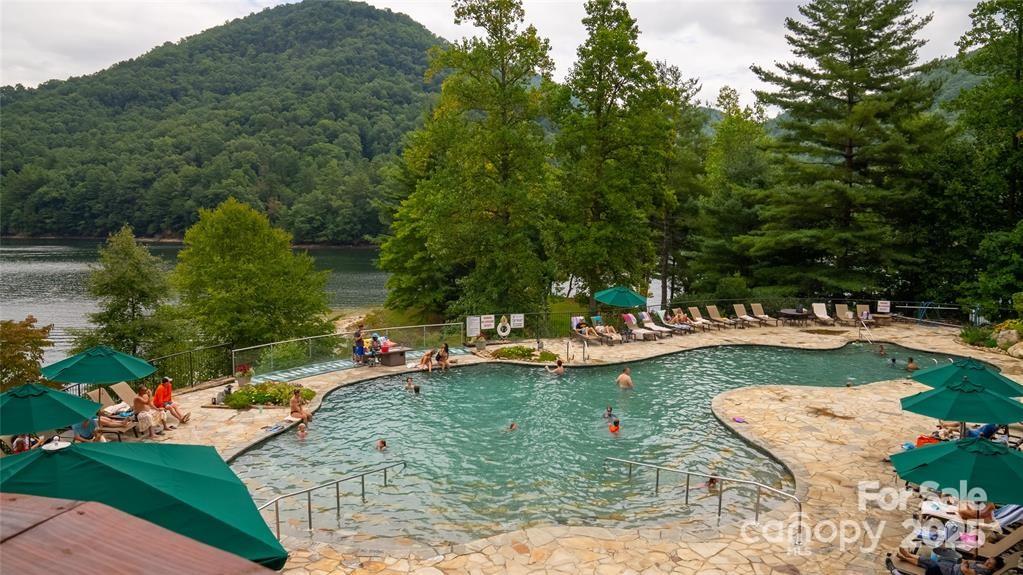 Lot 103 Longview Lane, Unit 103 Tuckasegee, NC 28783 - Photo 12 of 12 a view of a swimming pool with a patio