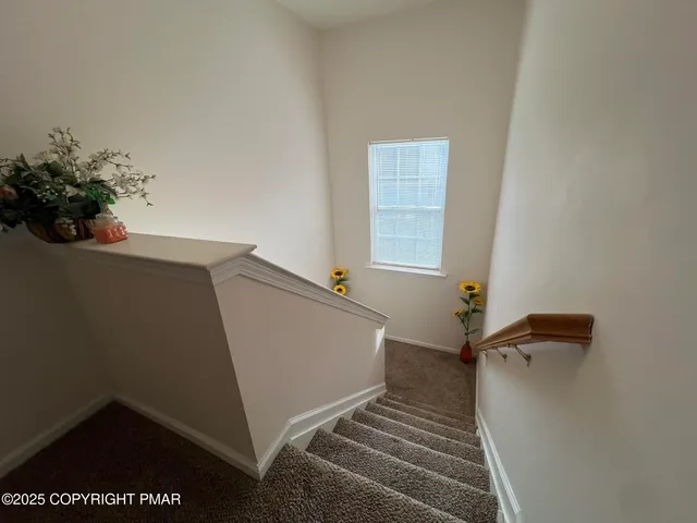 a view of utility room and bedroom