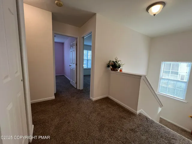 a bathroom with a sink mirror and vanity