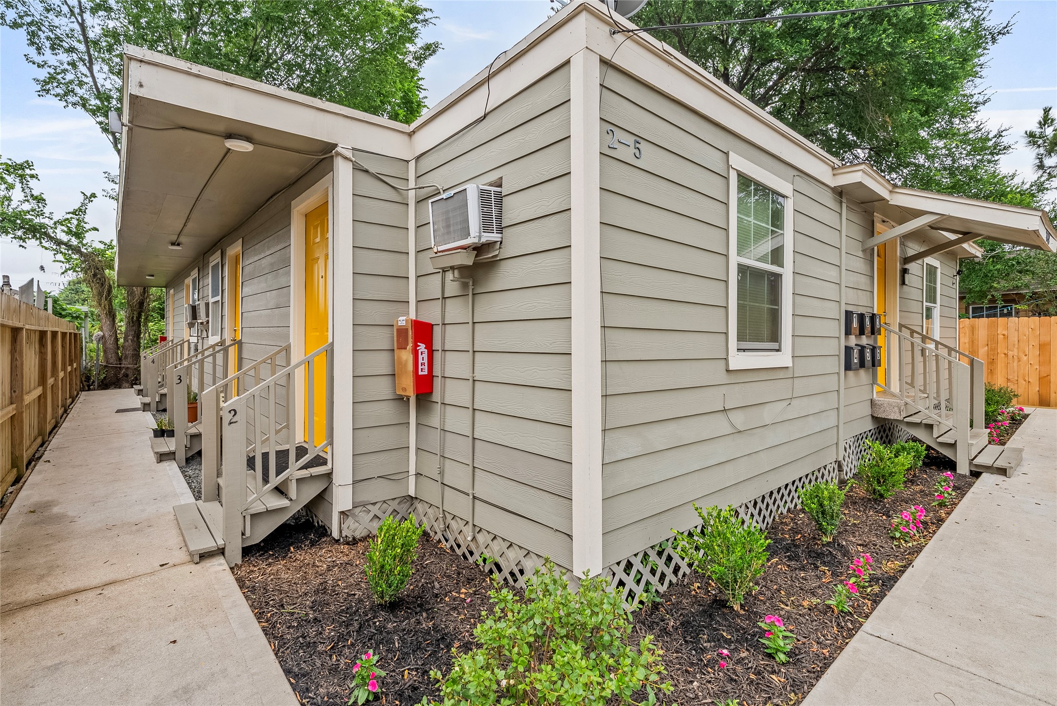7938 Kerr Street, Unit 6 Houston, TX 77029 - Photo 2 of 18 a view of a house with a yard