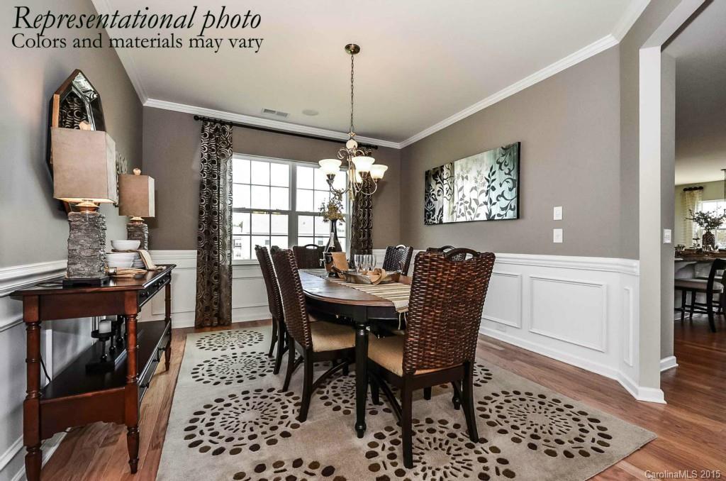 4224 Perth Road, Unit 304 Indian Land, SC 29707 - Photo 4 of 14 a view of a dining room with furniture