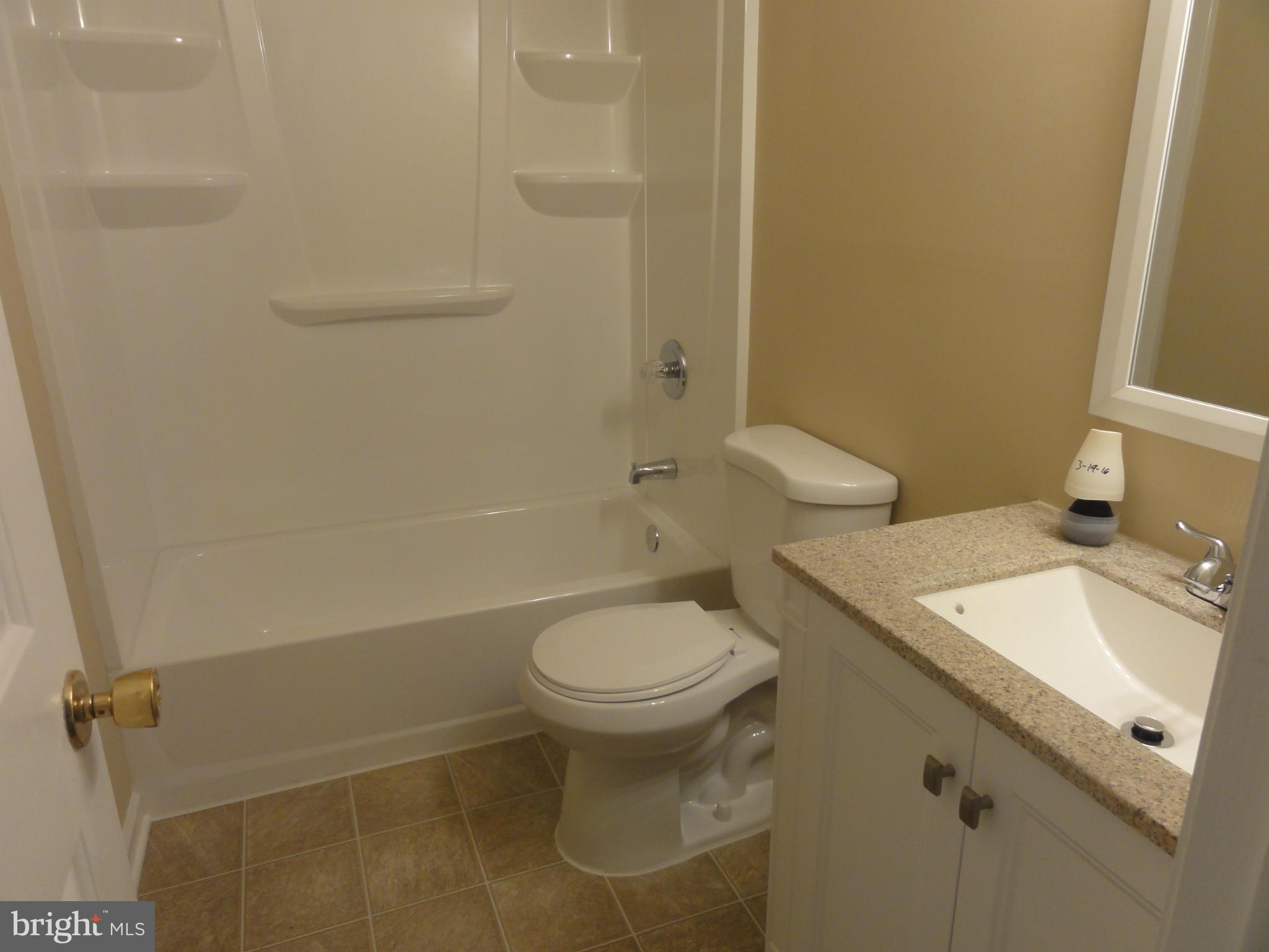 422 Long View Road Linden, VA 22642 - Photo 14 of 22 a bathroom with a sink toilet and shower