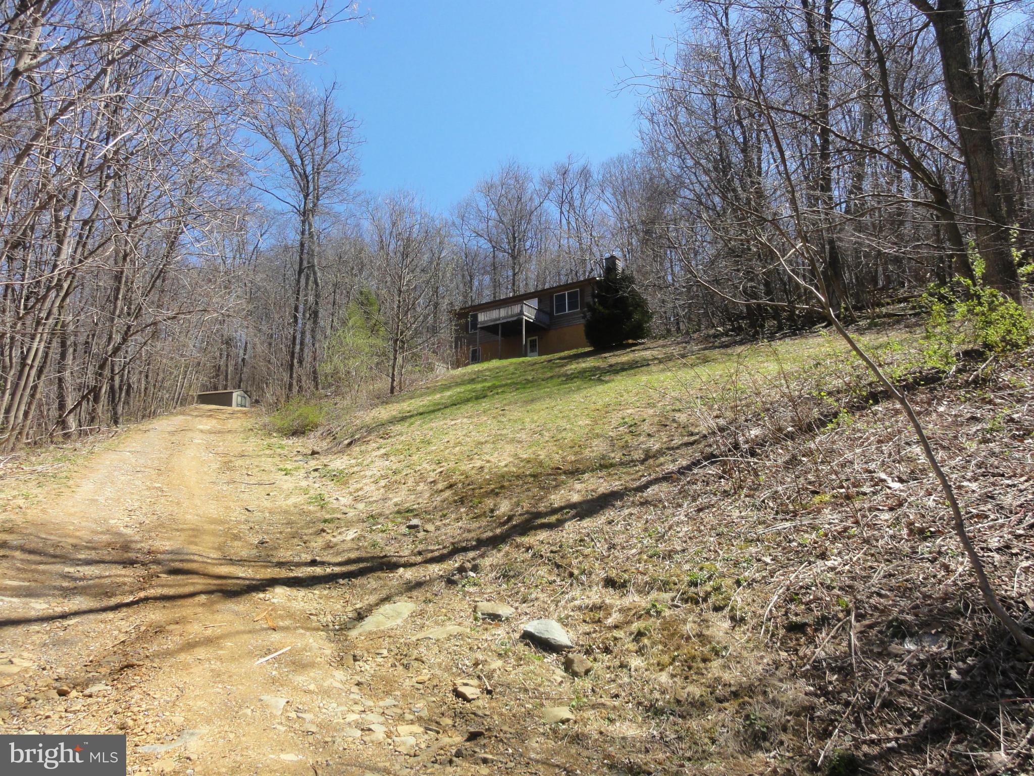 422 Long View Road Linden, VA 22642 - Photo 3 of 22 a view of backyard with wooden fence