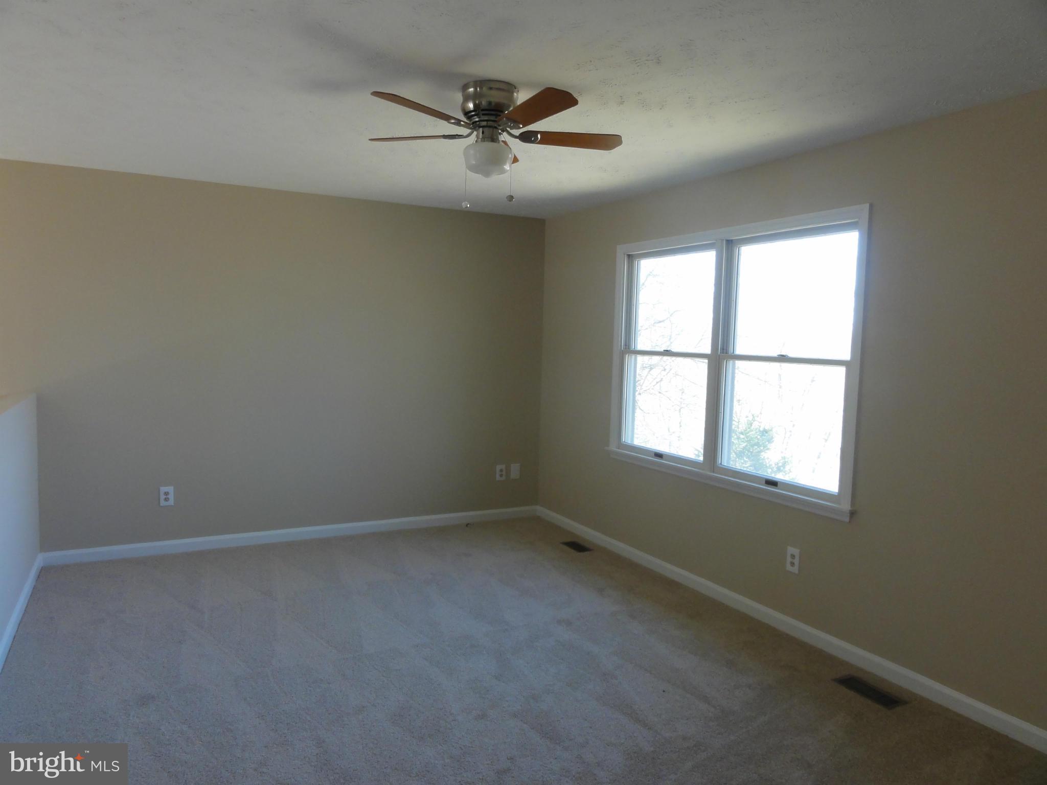 422 Long View Road Linden, VA 22642 - Photo 8 of 22 an empty room with a window