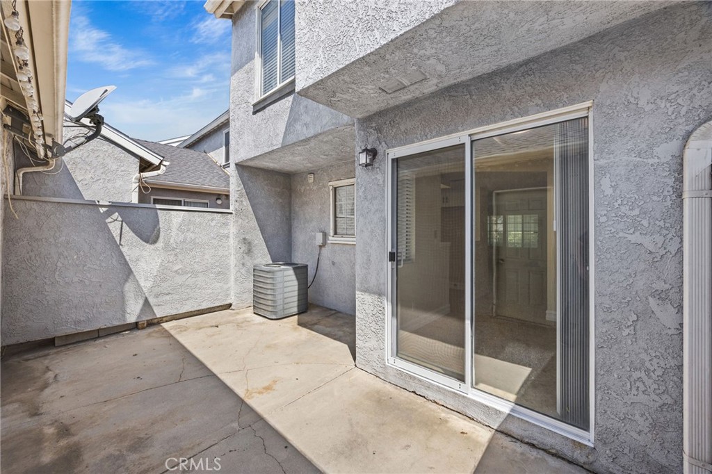 174 West Walnut Avenue, Unit B Rialto, CA 92376 - Photo 12 of 25 a balcony view with a glass door shower