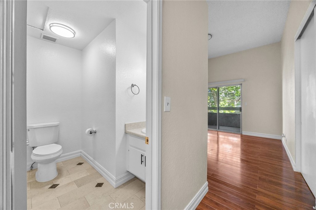 174 West Walnut Avenue, Unit B Rialto, CA 92376 - Photo 20 of 25 a bathroom with a toilet and a shower
