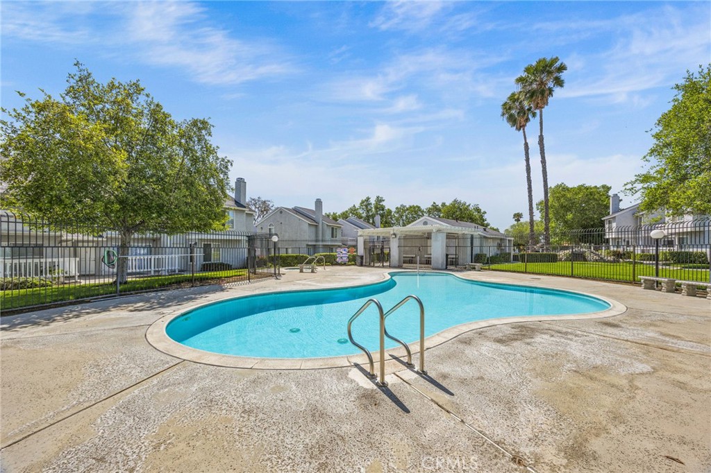 174 West Walnut Avenue, Unit B Rialto, CA 92376 - Photo 21 of 25 a view of a swimming pool with a patio