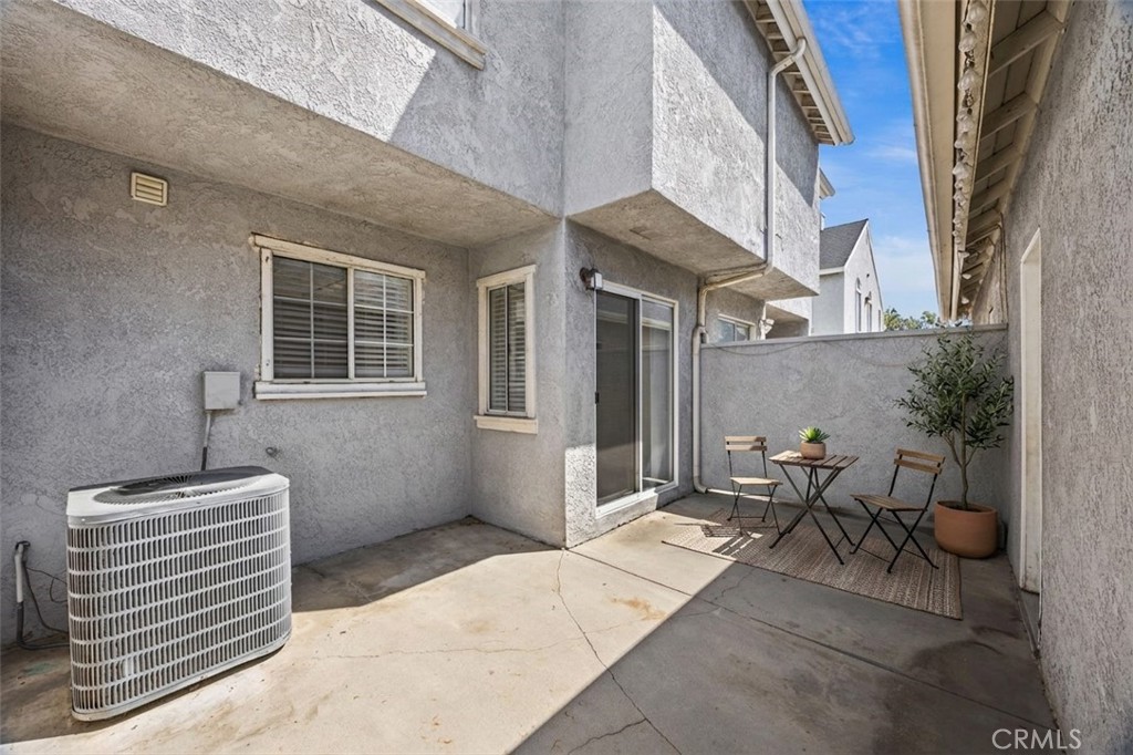 174 West Walnut Avenue, Unit B Rialto, CA 92376 - Photo 10 of 25 a backyard of a house with outdoor seating
