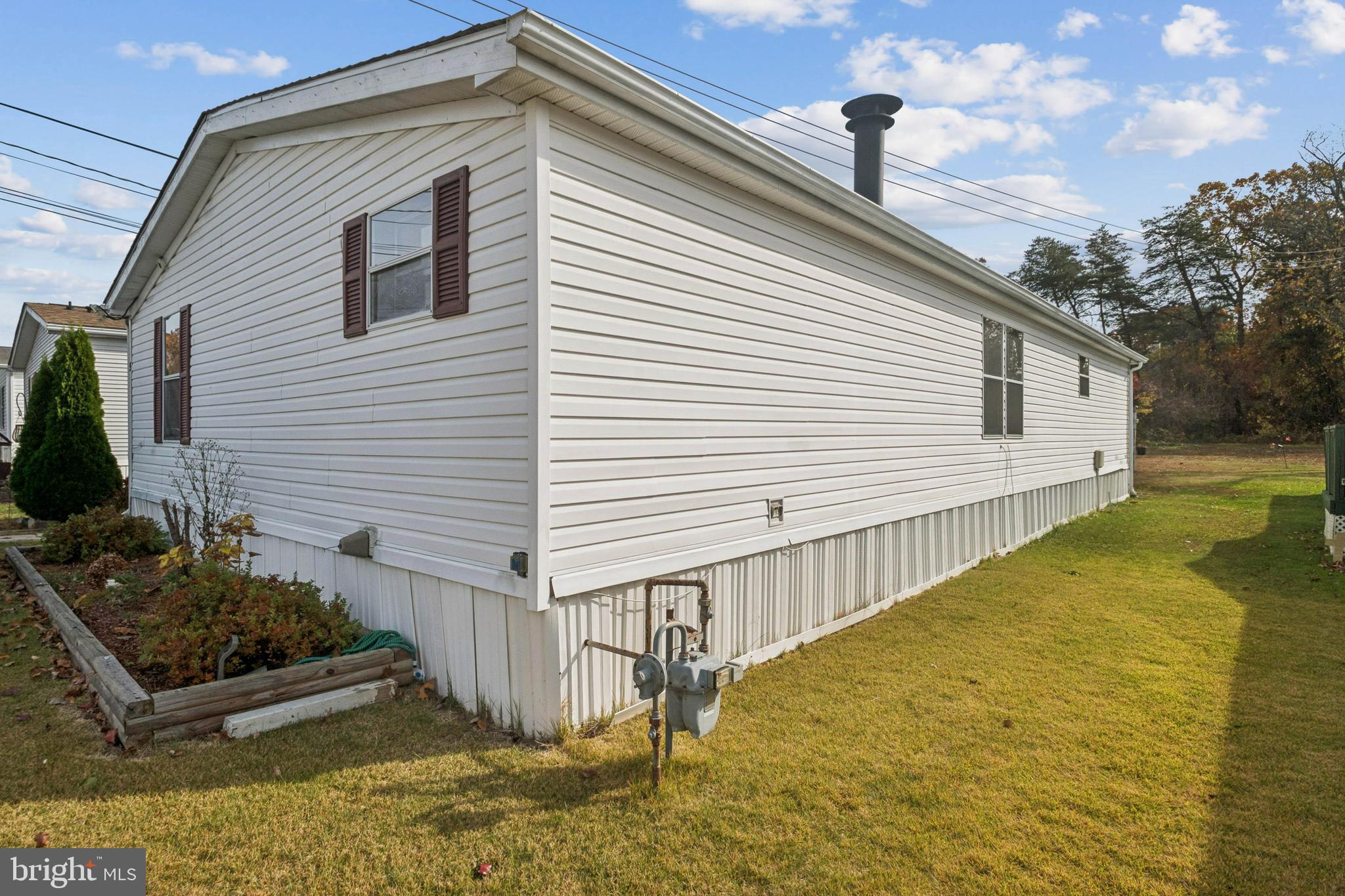 7959 Telegraph Road, Unit 5 Severn, MD 21144 - Photo 14 of 14 a view of a backyard with chairs