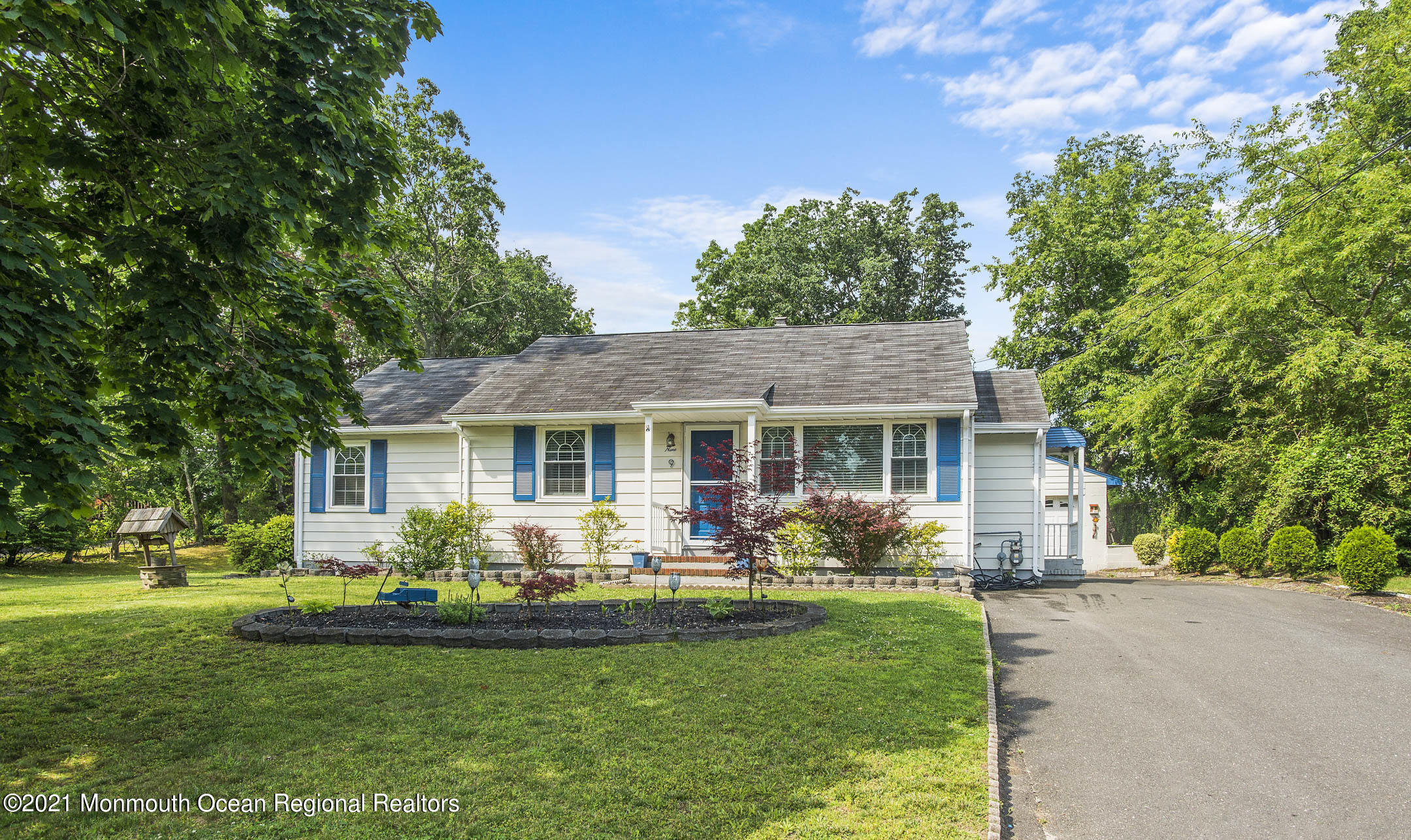 9 Pine Road Howell, NJ 07731 - Photo 2 of 26 a front view of a house with garden