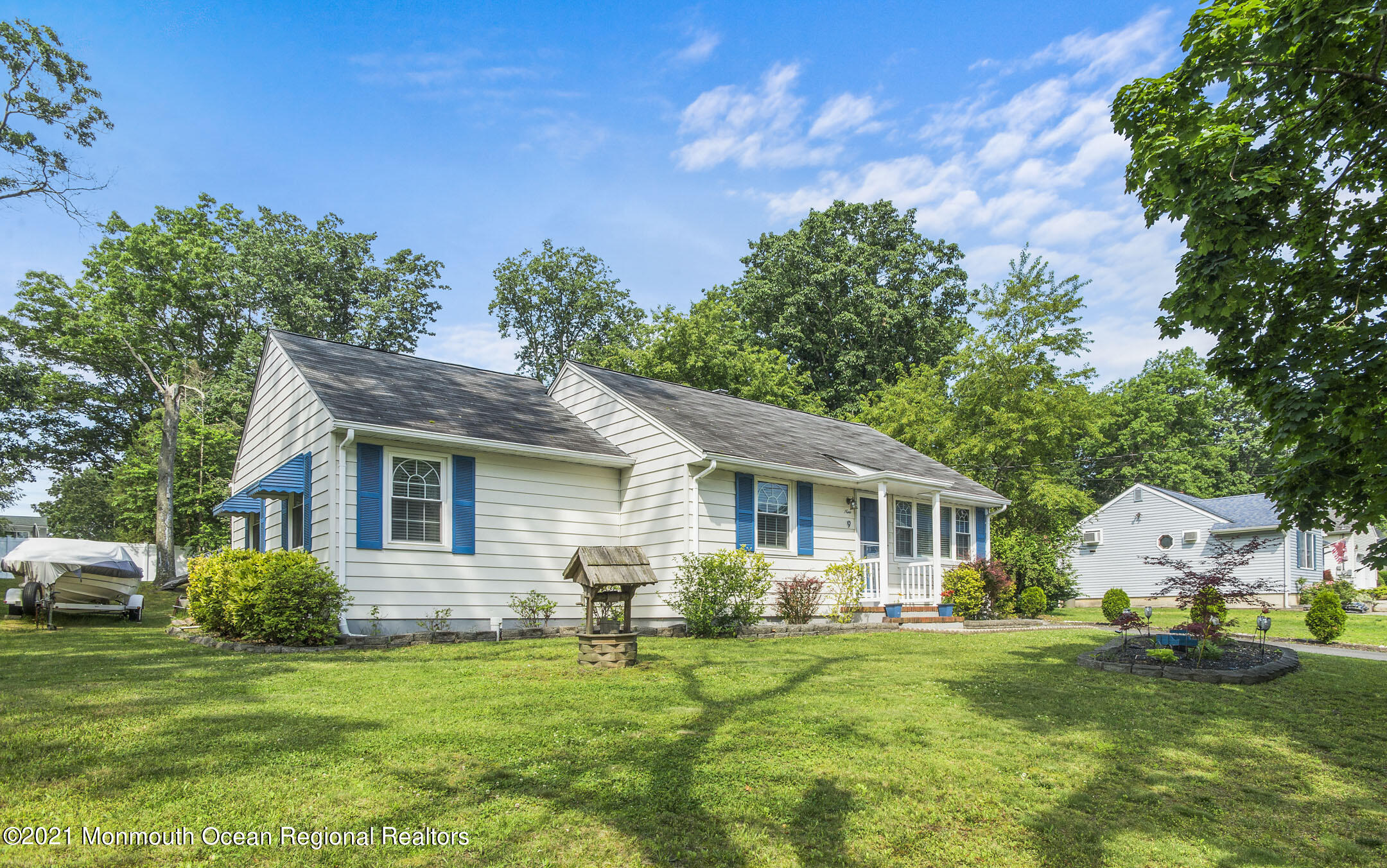 9 Pine Road Howell, NJ 07731 - Photo 3 of 26 a front view of a house with a garden
