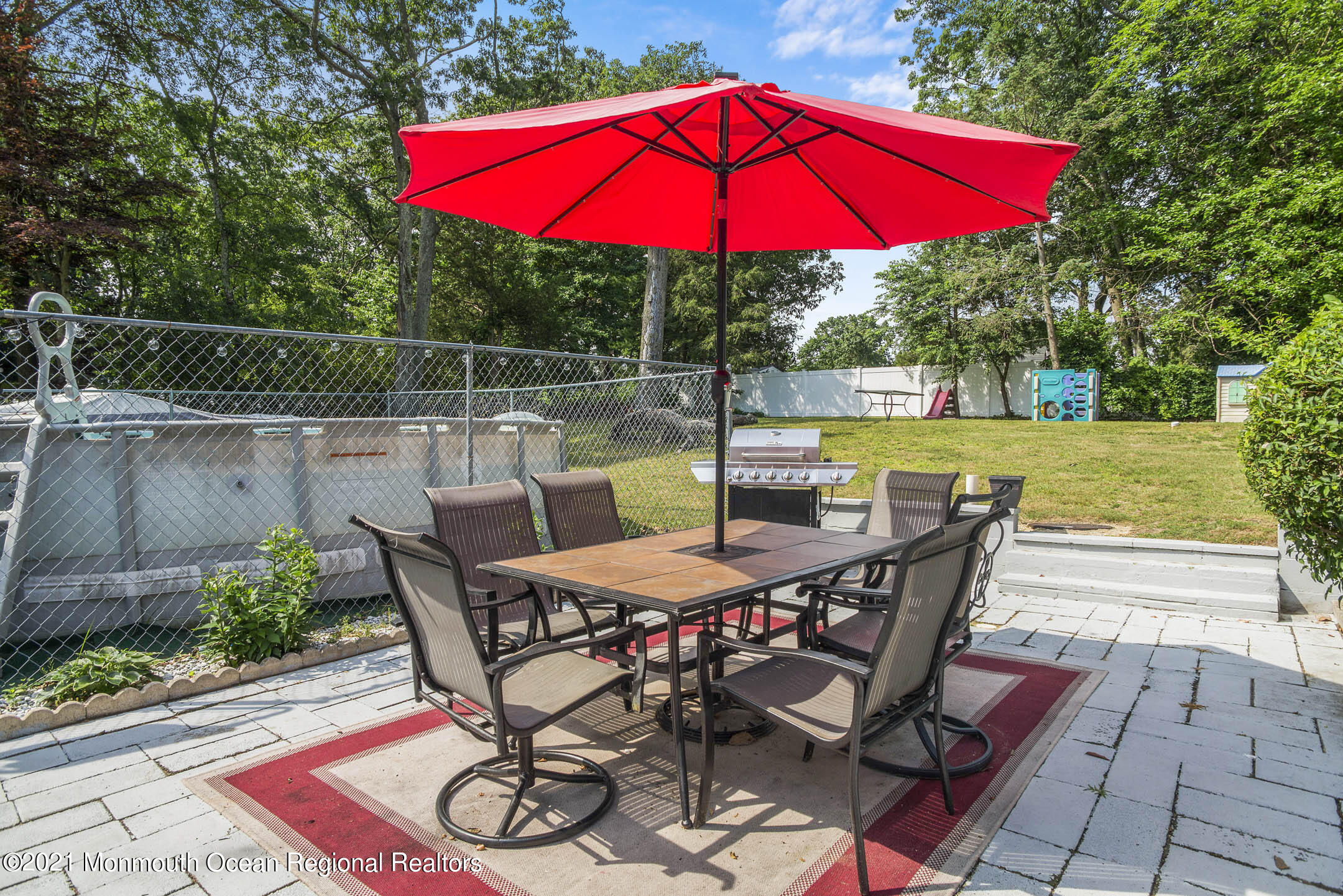 9 Pine Road Howell, NJ 07731 - Photo 22 of 26 a view of deck with furniture and barbeque oven