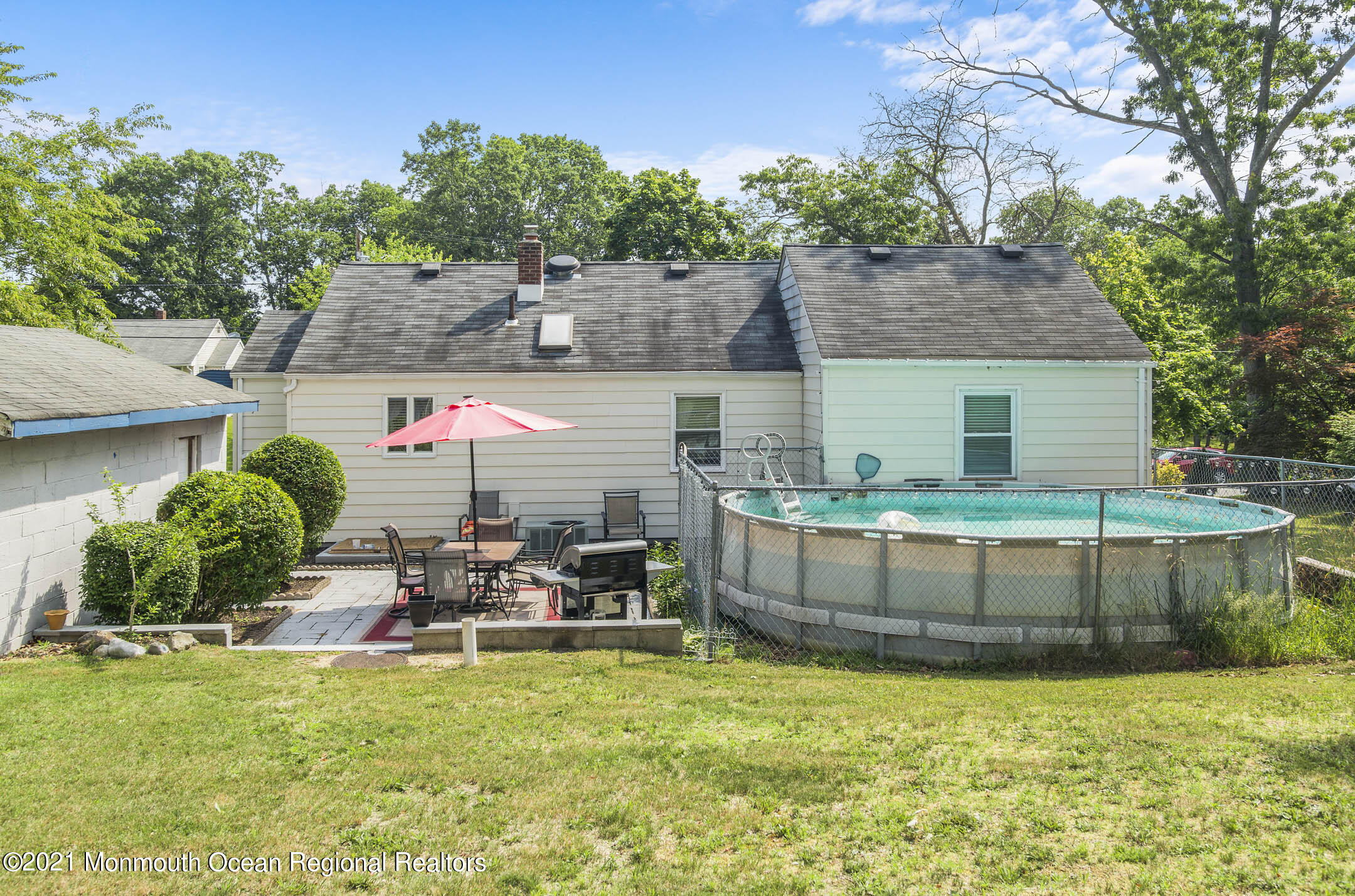 9 Pine Road Howell, NJ 07731 - Photo 24 of 26 a view of a house with backyard and sitting area