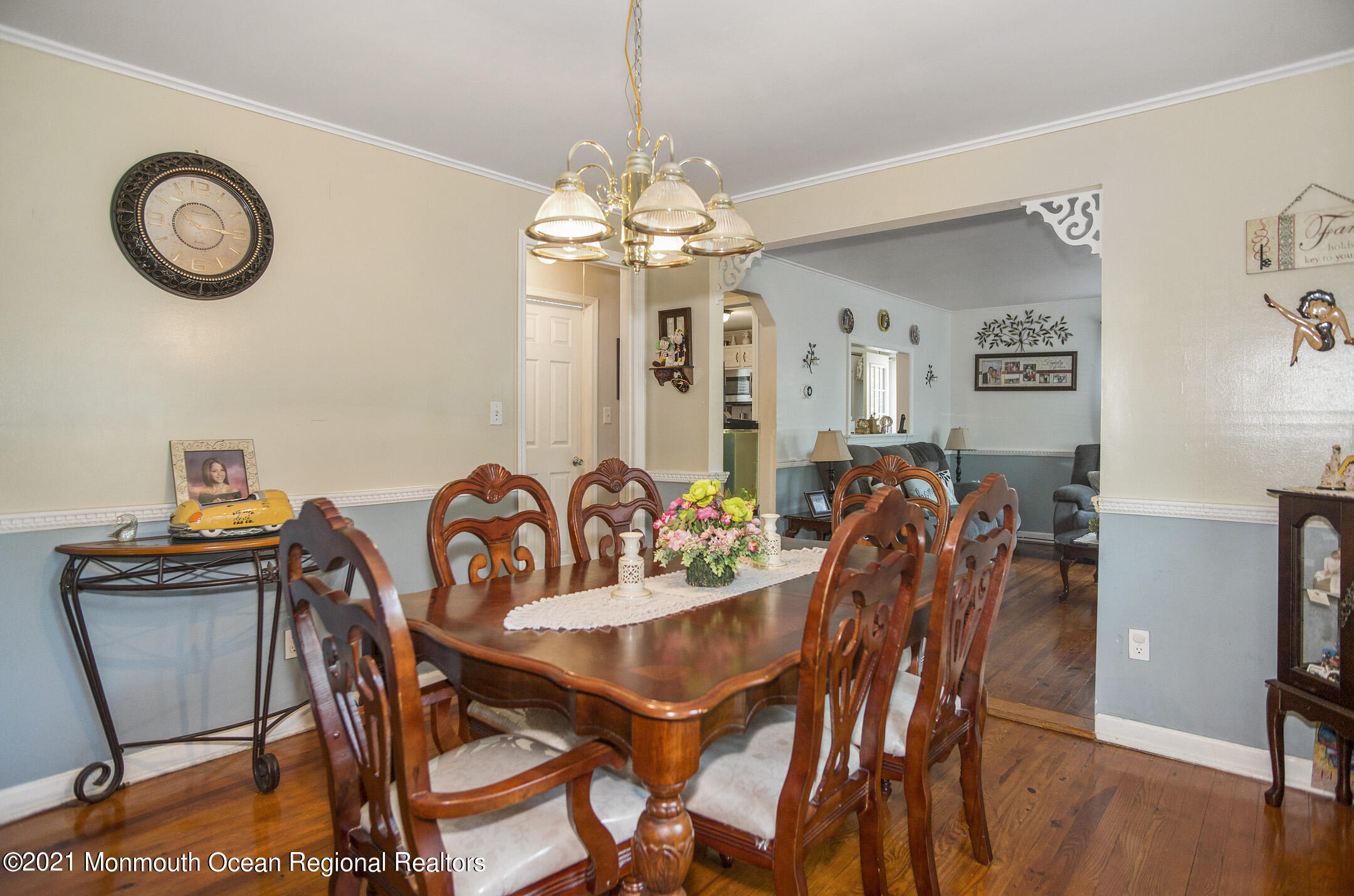 9 Pine Road Howell, NJ 07731 - Photo 9 of 26 a view of a dining room with furniture and wooden floor