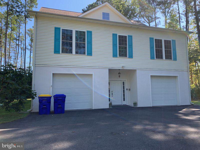 31613 Charleys Run Bethany Beach, DE 19930 - Photo 1 of 30 a house view with a outdoor space
