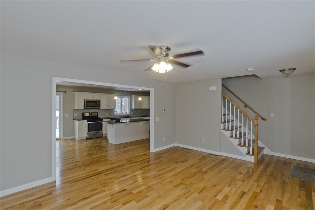 239 Gresham Street Springfield, MA 01119 - Photo 15 of 39 a view of kitchen with furniture wooden floor and window
