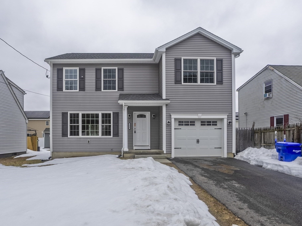 239 Gresham Street Springfield, MA 01119 - Photo 2 of 39 a view of a house with a yard