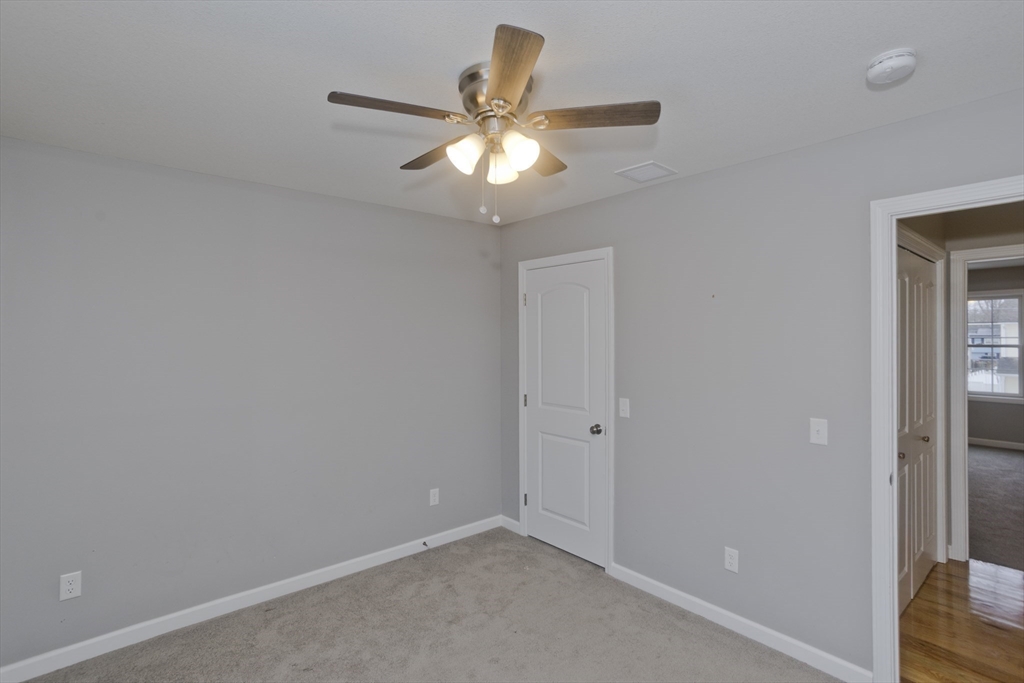 239 Gresham Street Springfield, MA 01119 - Photo 24 of 39 a view of an empty room and window