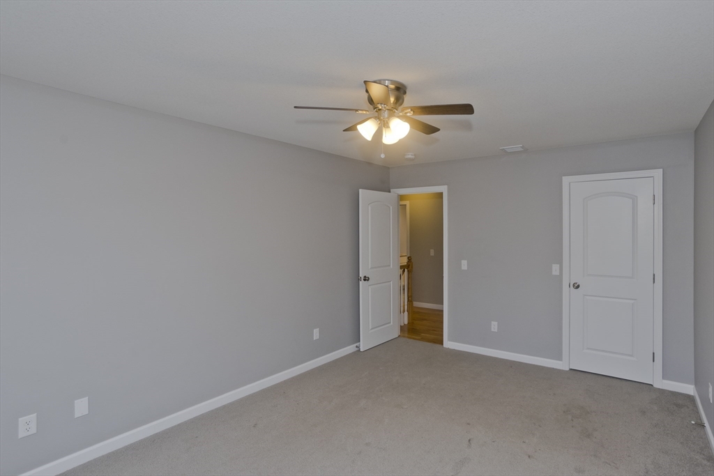 239 Gresham Street Springfield, MA 01119 - Photo 30 of 39 a view of empty room with fan