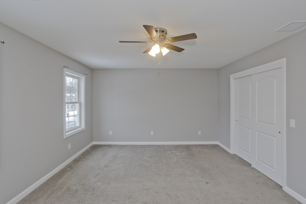 239 Gresham Street Springfield, MA 01119 - Photo 31 of 39 a view of empty room with window