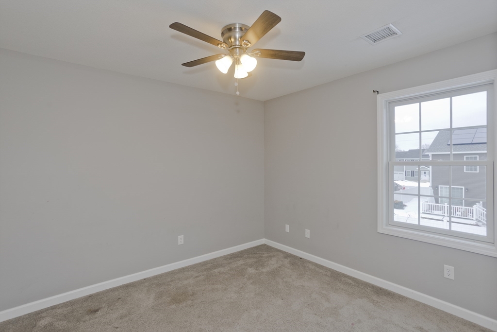 239 Gresham Street Springfield, MA 01119 - Photo 35 of 39 an empty room with a window