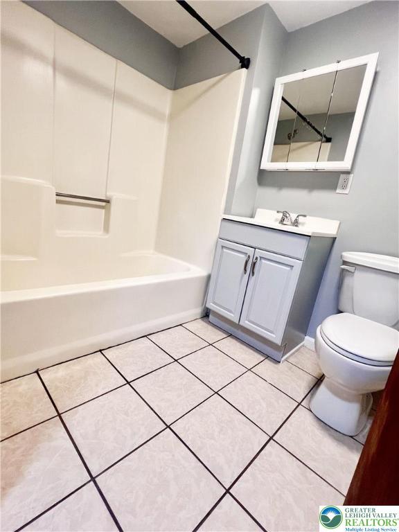 272 St John Street, Unit 5 Easton, PA 18042 - Photo 2 of 9 a bathroom with a sink a toilet a mirror and shower