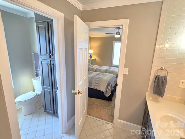 a bathroom with a sink and toilet