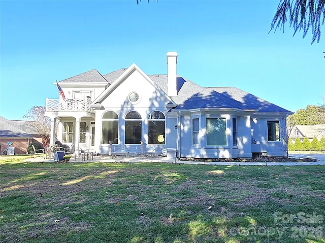 a front view of house with yard outdoor seating and yard