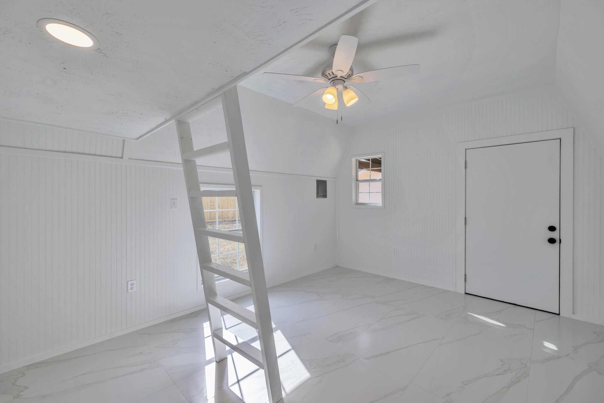 8709 Tarbell Road Houston, TX 77034 - Photo 24 of 25 a view of an empty room with a window