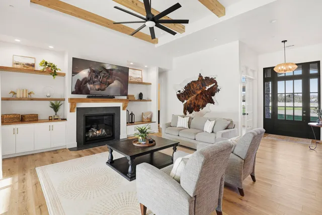 a bathroom with a granite countertop sink a vanity and a mirror