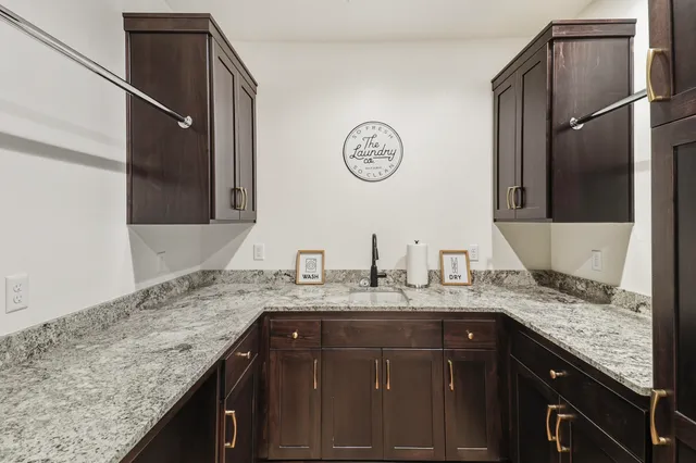 an empty room with windows and entrance