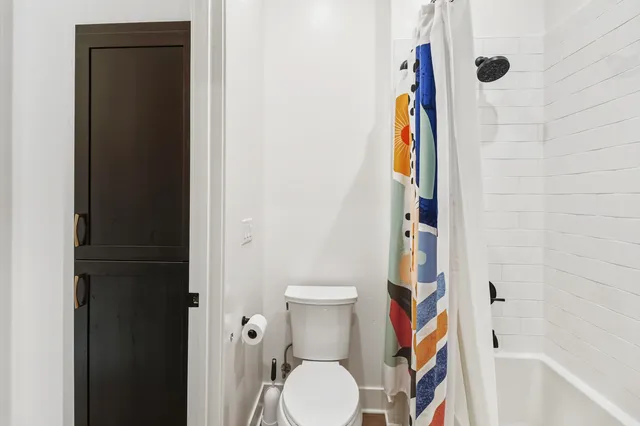 a view of a ceiling fan in a room