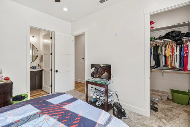 a swimming pool with outdoor seating and yard