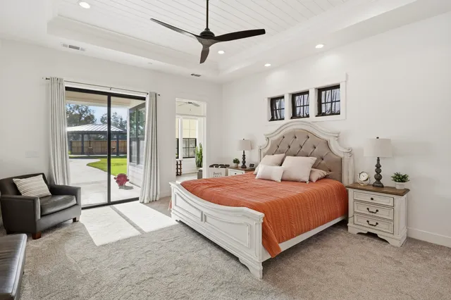a bathroom with a toilet a sink and shower