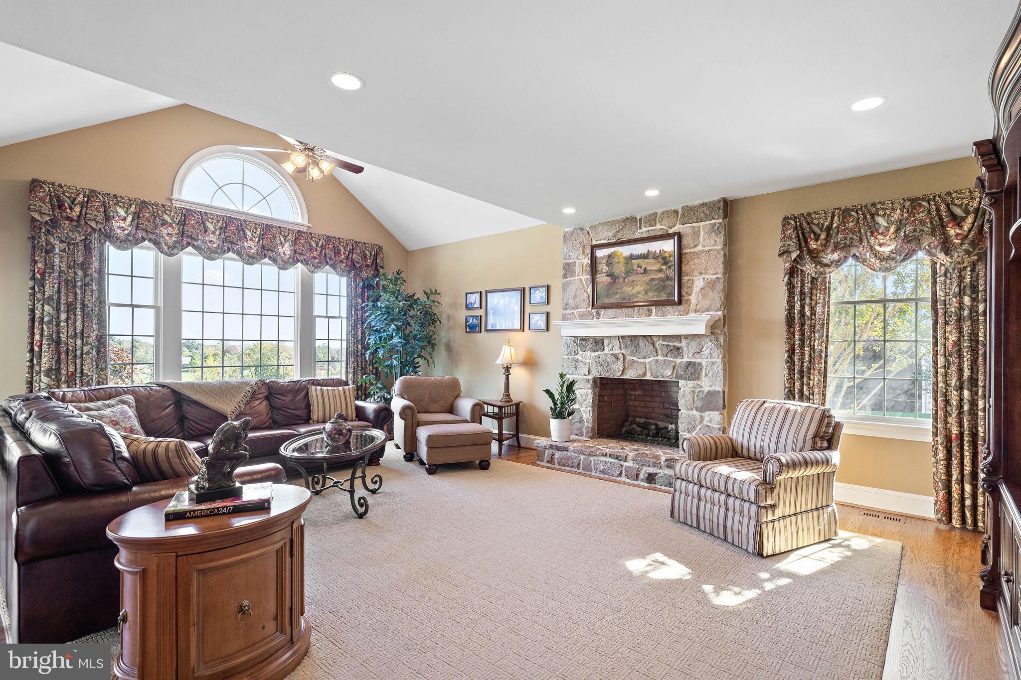 111 Bailey Circle Kennett Square, PA 19348 - Photo 18 of 64 Large family room with stone fireplace