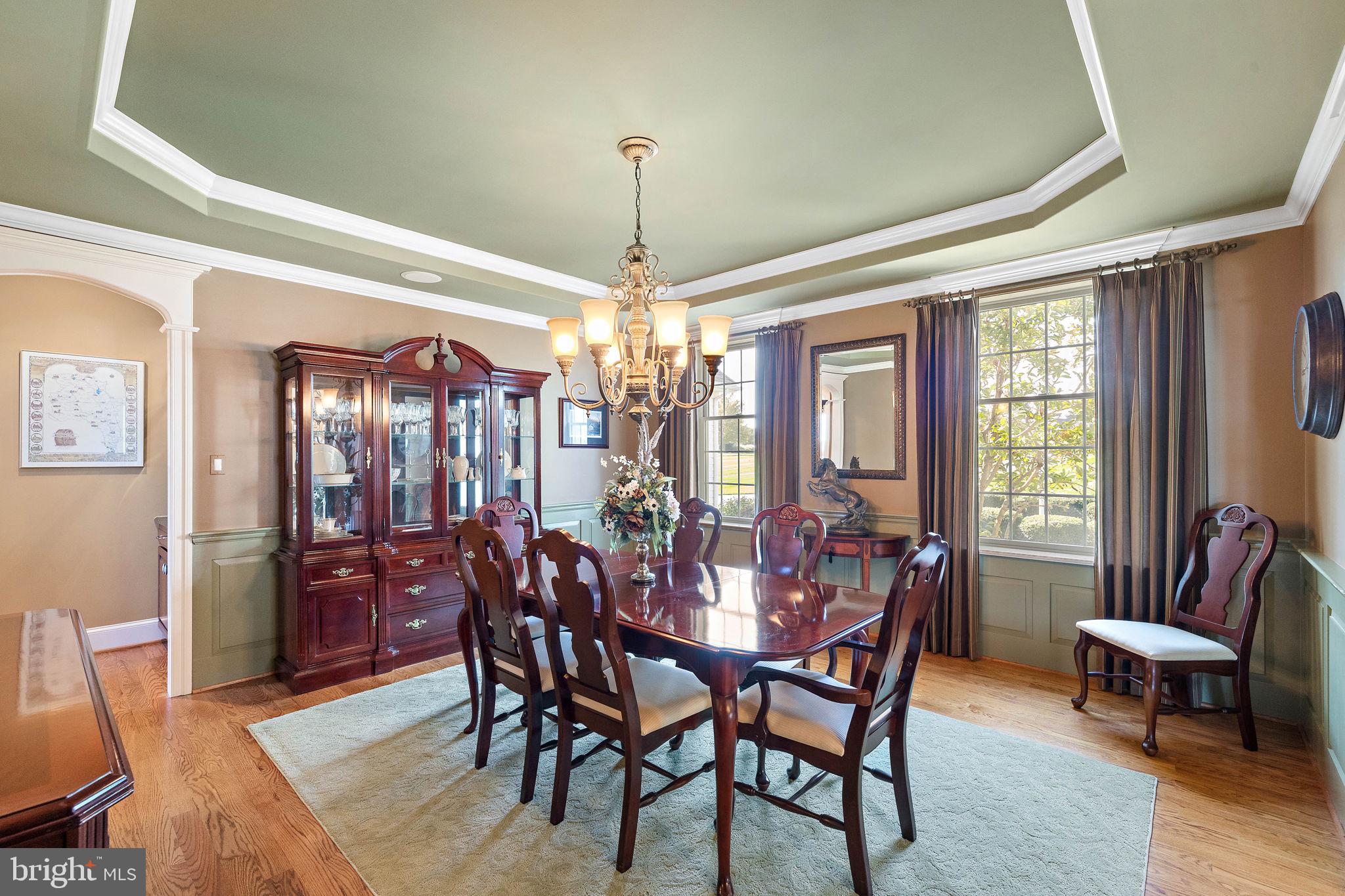 111 Bailey Circle Kennett Square, PA 19348 - Photo 8 of 64 Dining room with tray ceiling and wainscoting