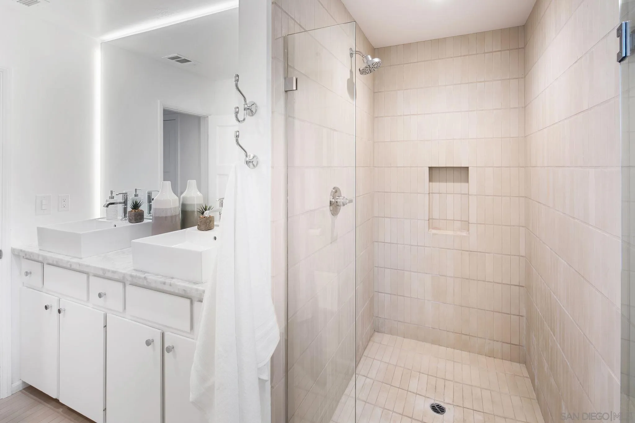 211 Ocean Street Solana Beach, CA 92075 - Photo 26 of 29 a bathroom with a shower and a sink