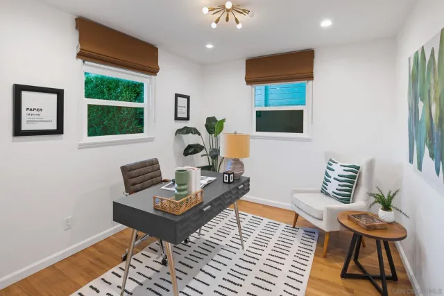 a bathroom with a sink a mirror and a shower