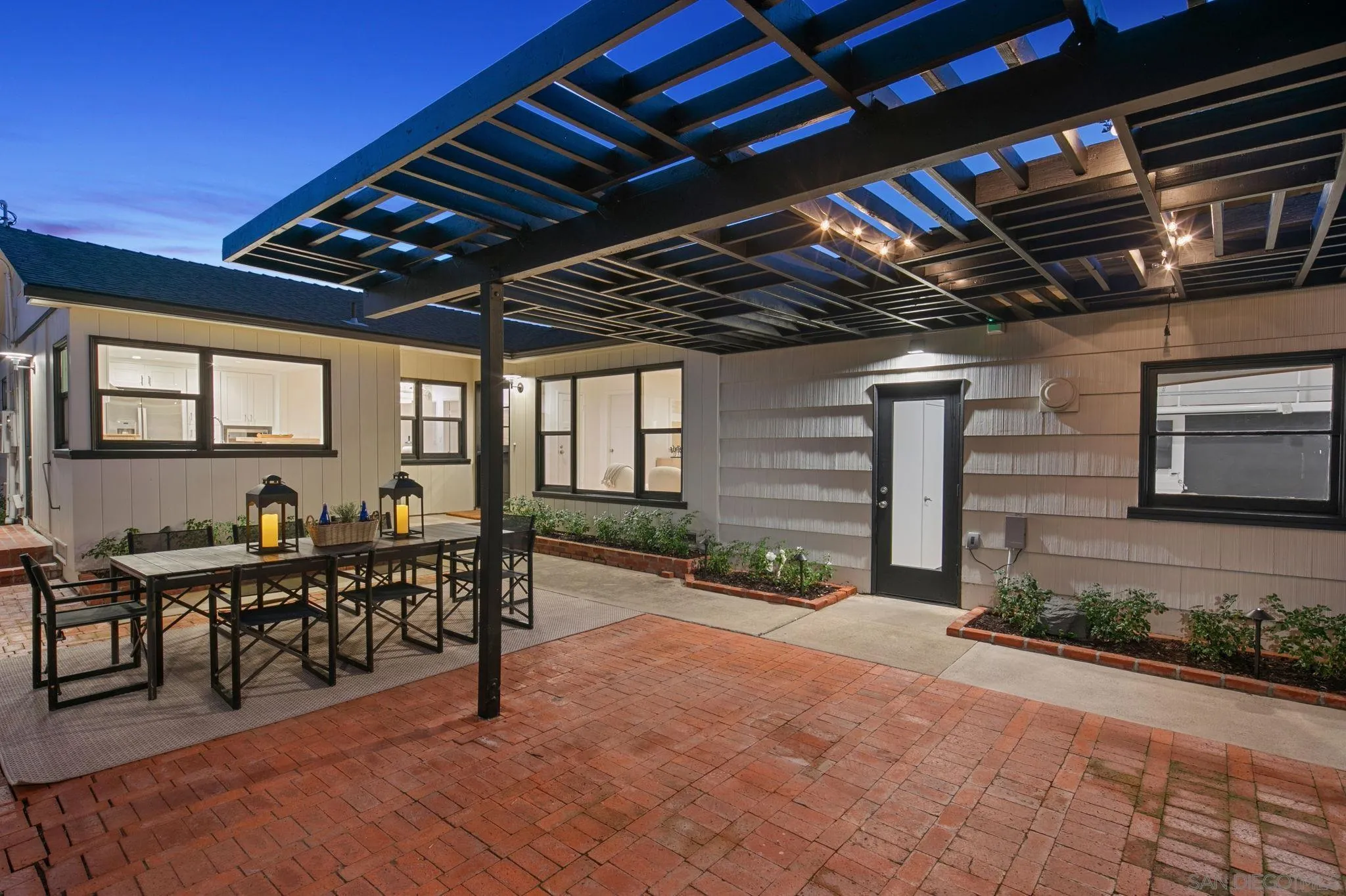 211 Ocean Street Solana Beach, CA 92075 - Photo 9 of 29 a view of a porch with chairs and potted plants