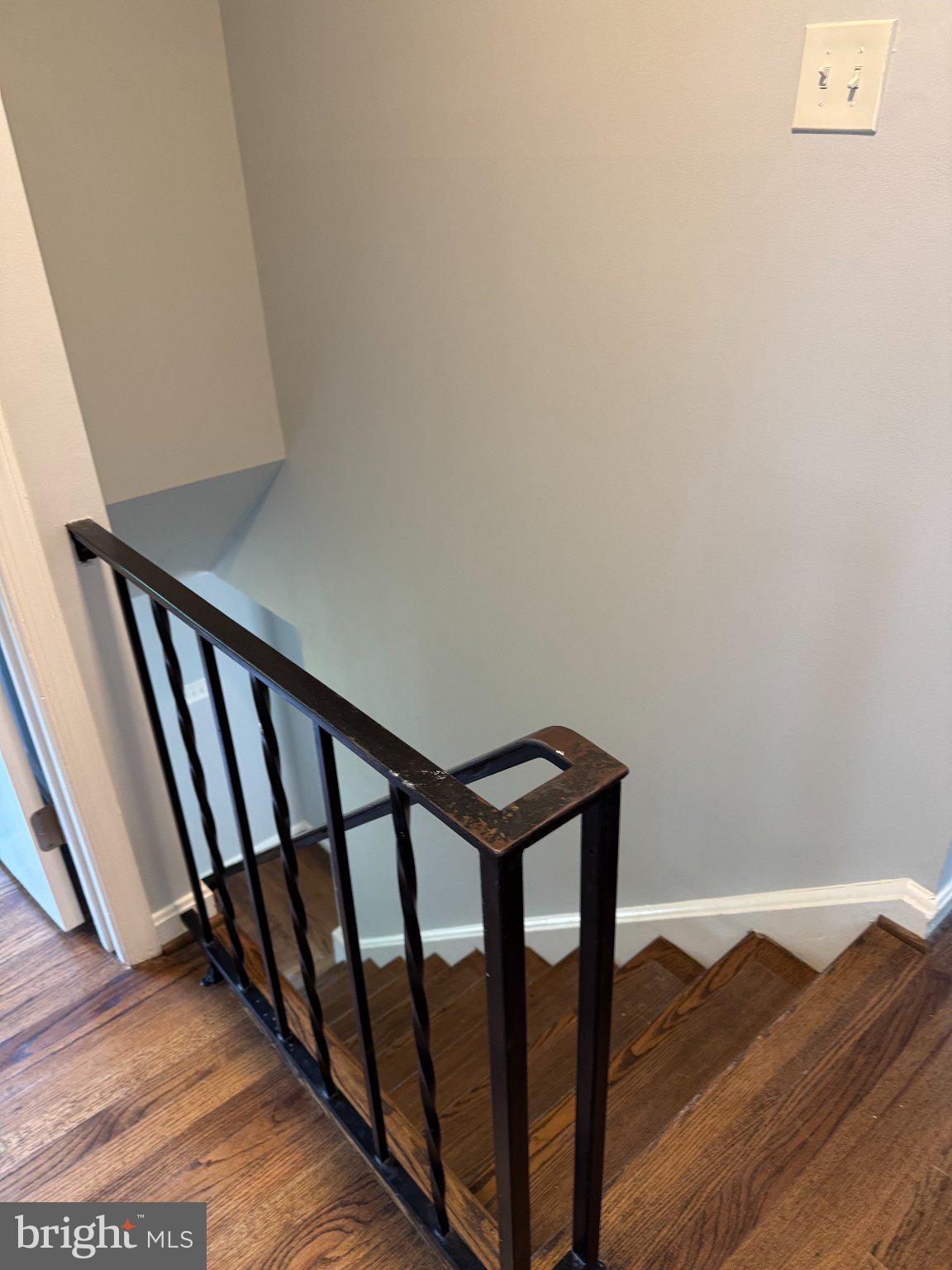 6603 Huntsman Boulevard Springfield, VA 22152 - Photo 18 of 64 Inviting staircase with classic charm.