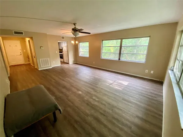 a view of an empty room with a window