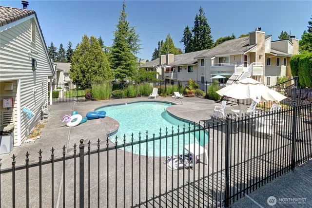 a view of a wrought iron fences in front of house
