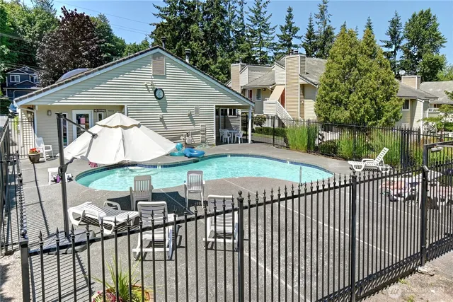 a view of a wrought iron fences in front of house